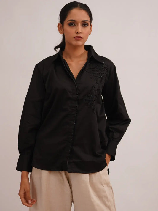 black shirt and beige pants for woman