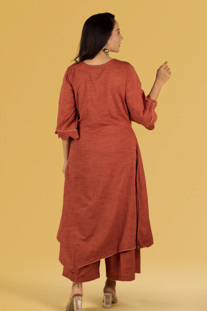 Woman wearing a rust-colored dress