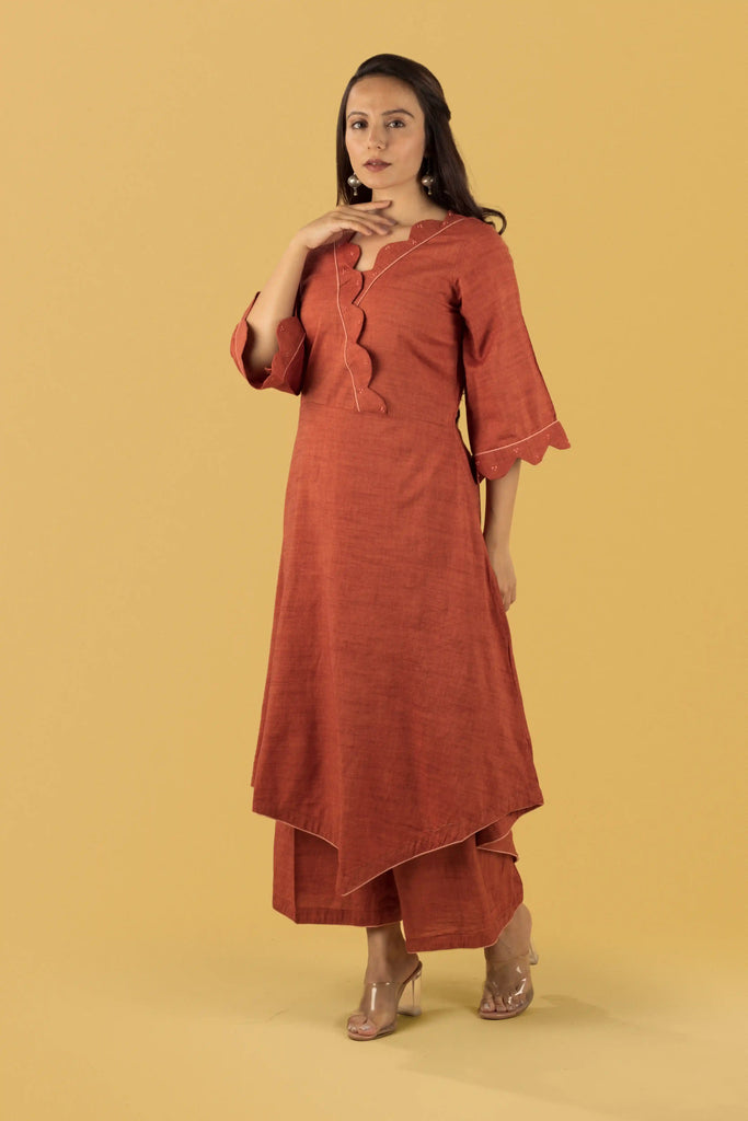 Woman wearing a burnt orange dress