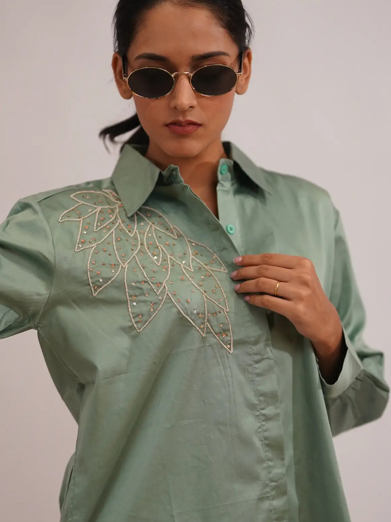 Woman wearing a green shirt