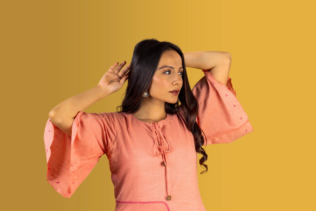 Woman wearing a pink blouse