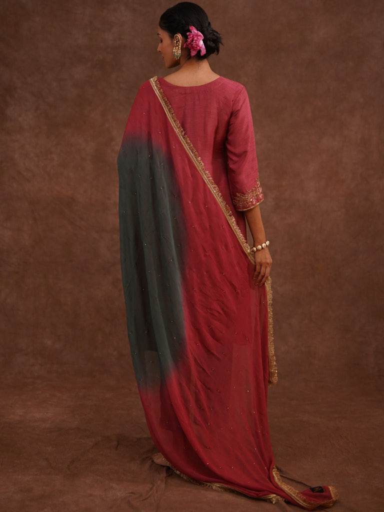 Woman wearing a red saree