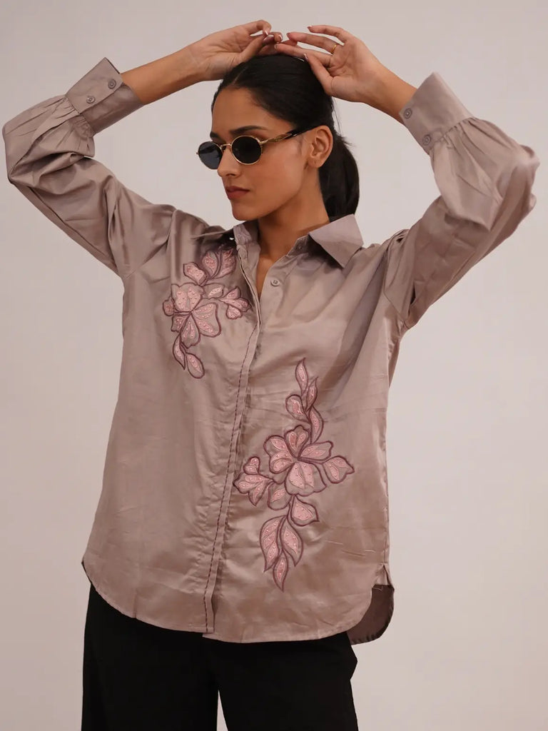 Woman wearing a beige shirt 